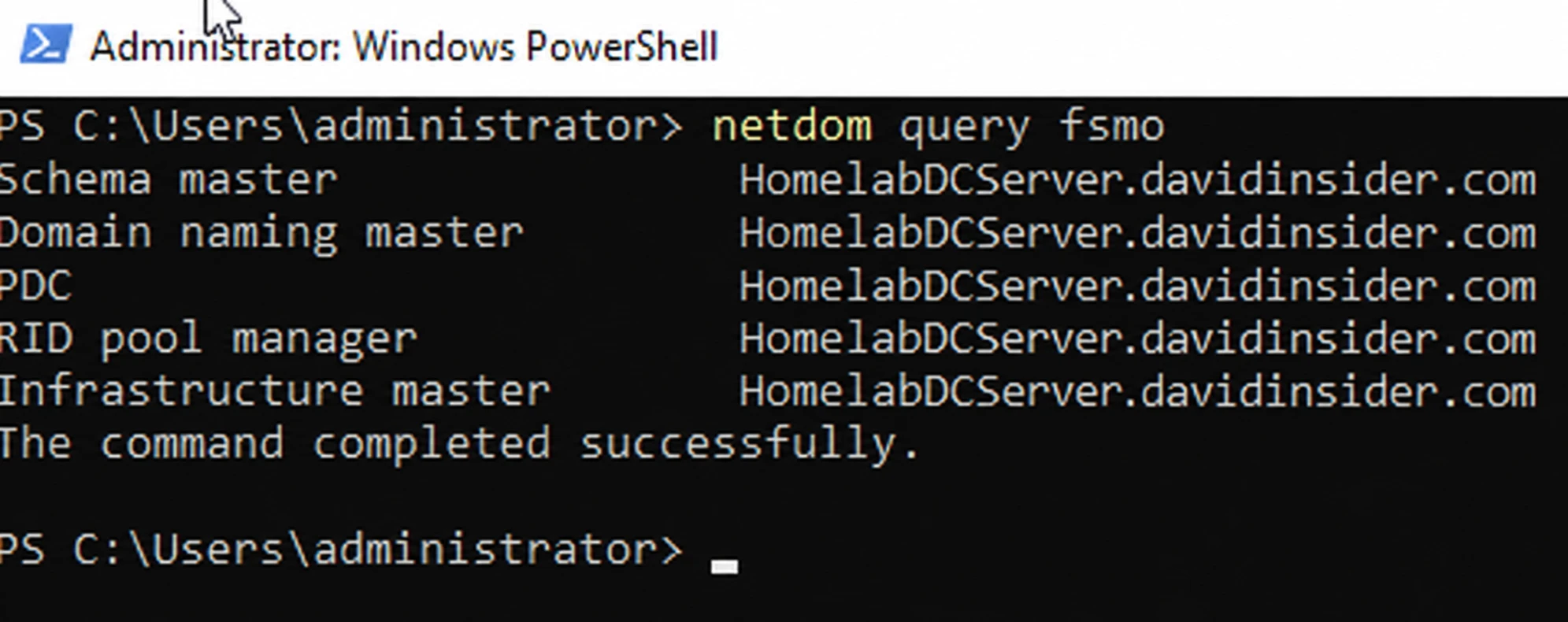 All five FSMO roles on the first domain controller
